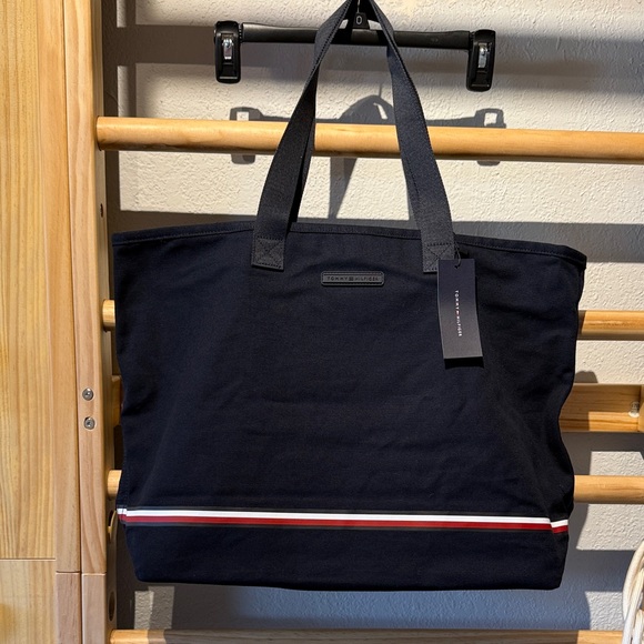 Tommy Hilfiger Handbags - Tommy Hilfiger Black Duffel Bag with Red and White Stripe